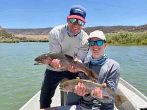 Father and son fly fishing fathers day