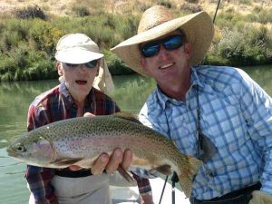 Elderly man san juan river large rainbow trout
